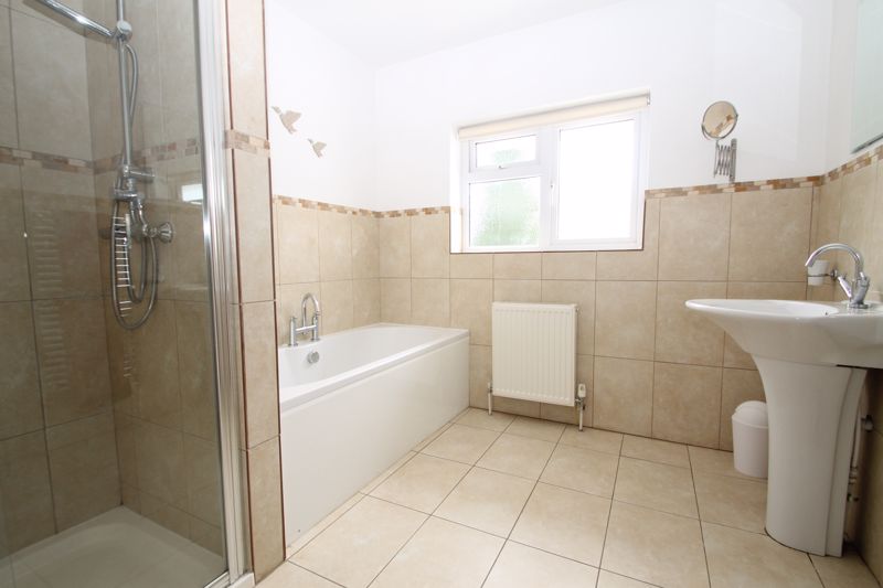 Bathroom with separate shower